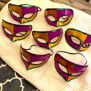 Set of 7 Mardi Gras Masks! Hard plastic purple masks. Very hearty and will last!